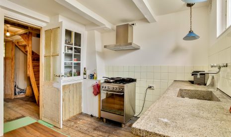 Te koop: Foto Appartement aan de Warmoesstraat 19 in Haarlem